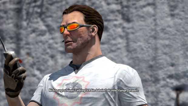 Sam Stone mit Fernzünder für eine Bombe